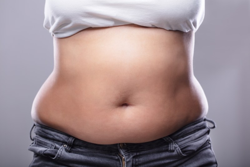 Woman with belly fat