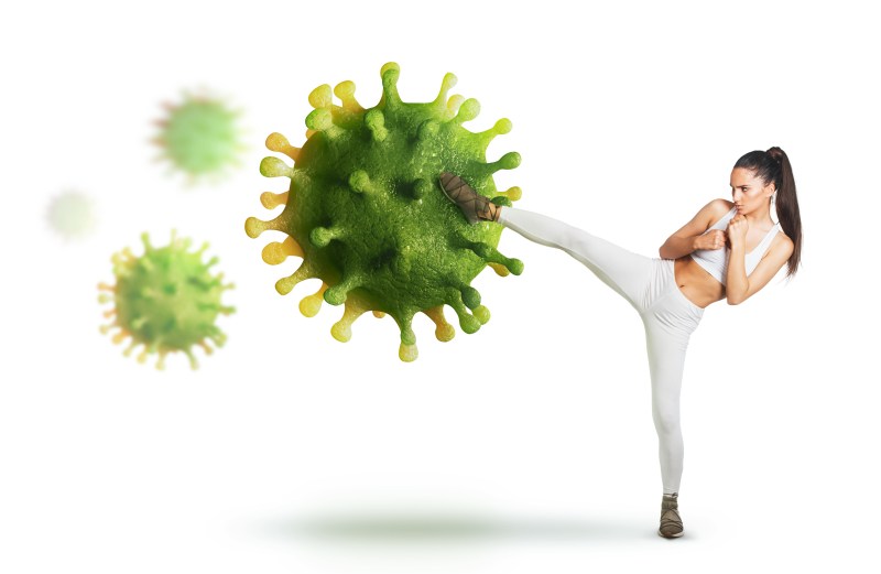 Woman kicking a virus